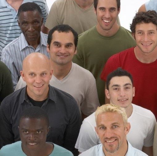 Photo of a group of diverse fathers, smiling