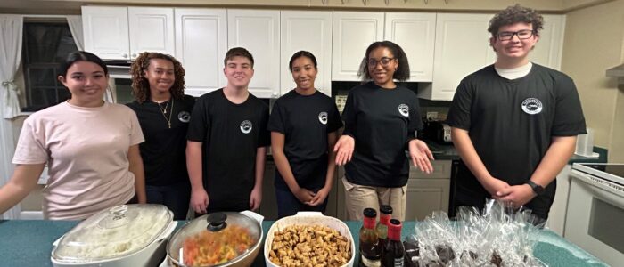 YLC team members with food