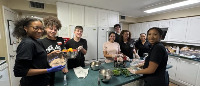 YLC team members prepping food