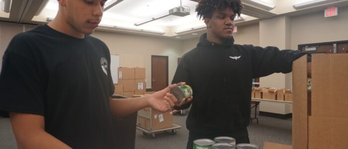 YLC students with boxes