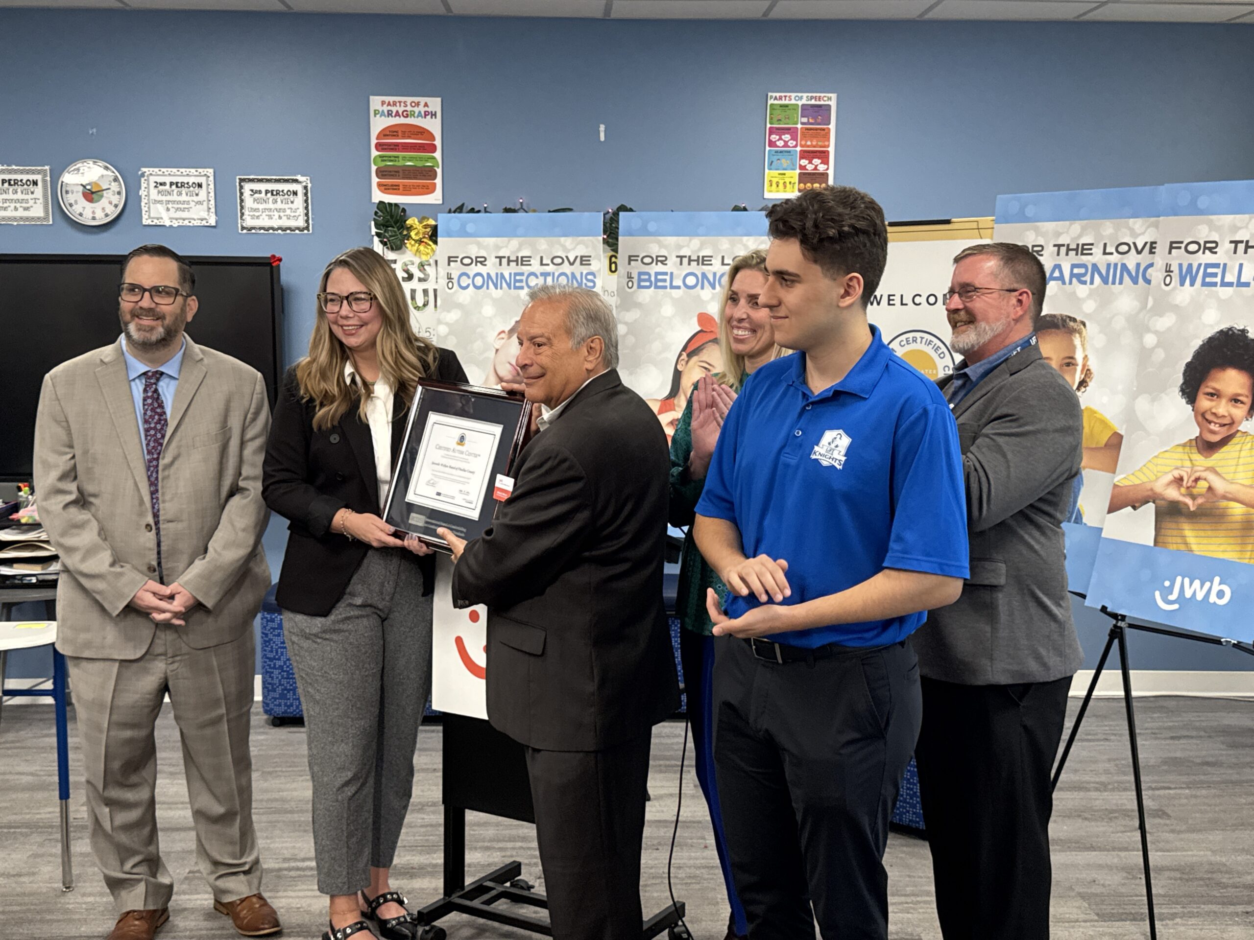 The certificate was presented at Learning Independence for Tomorrow (LiFT),as their staff and students celebrated with JWB. 